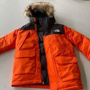 Boys Northface winter coat - orange and black - Size medium 10-12.  Worn once.